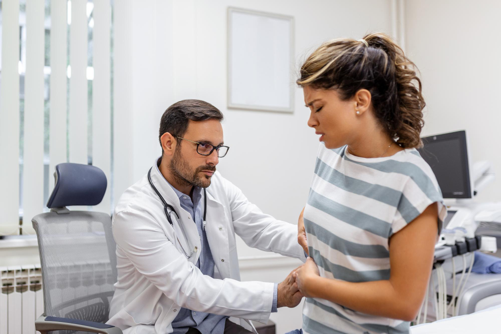 Patient telling physician about her pain and health problems during visit to hospital yo